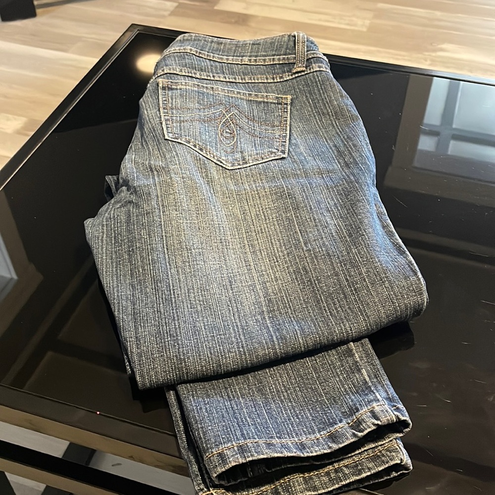 Jeans are legging style. Size 11 average. 74% cotton,25% polyester, 1% spandex.